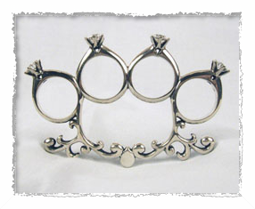 Brass knuckles wedding ring framed